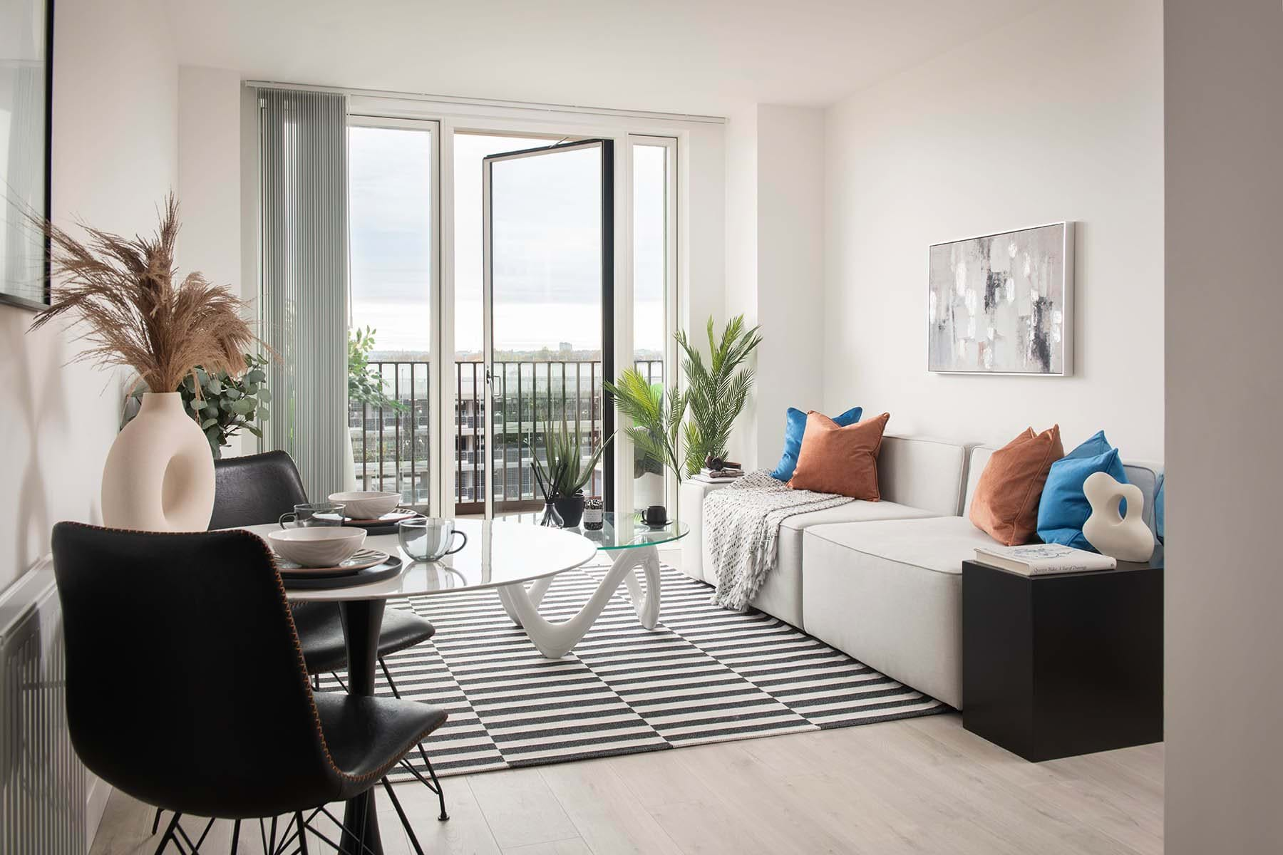 Dining area and living-room at one of our New Mansion Square 1-bedroom home