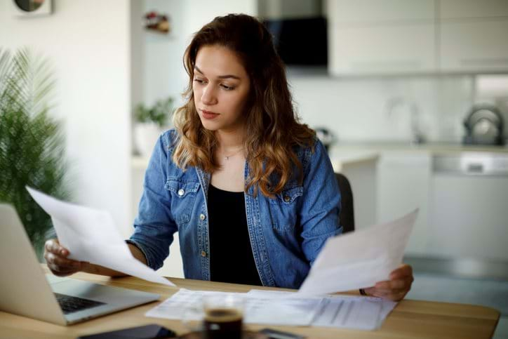 Young woman assessing her finances